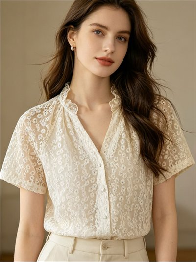 Camicetta in pizzo floreale con colletto a balze