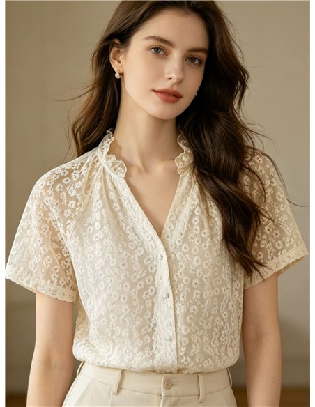 Camicetta in pizzo floreale con colletto a balze