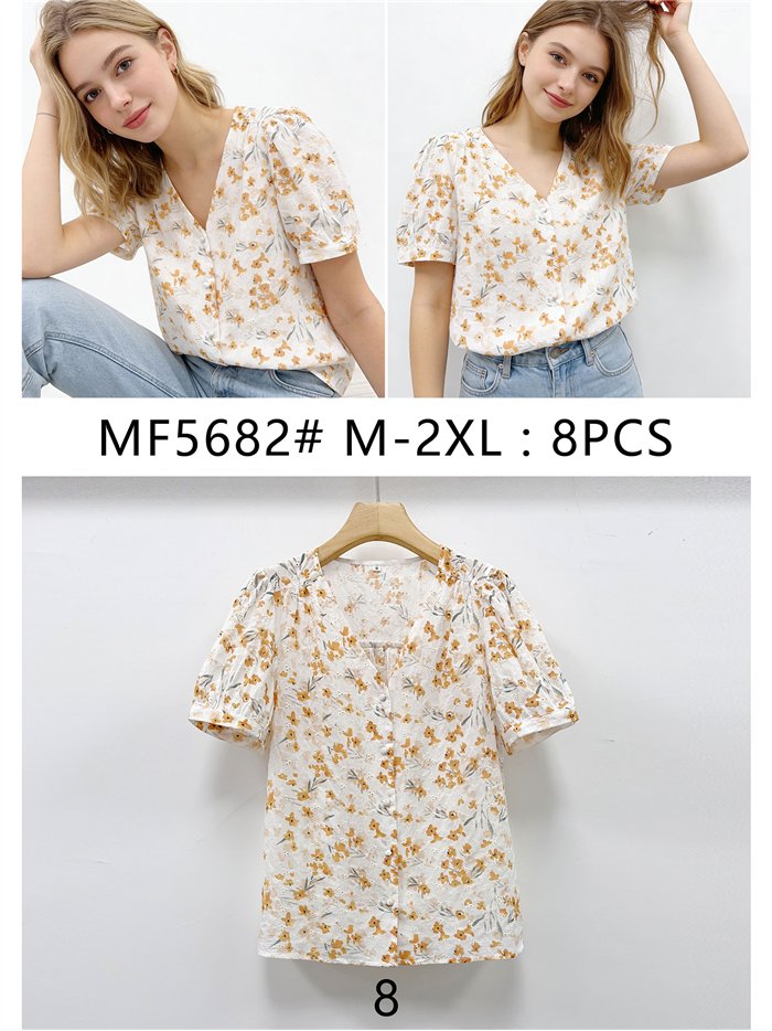 Blusa floral mostaza manga abullonada