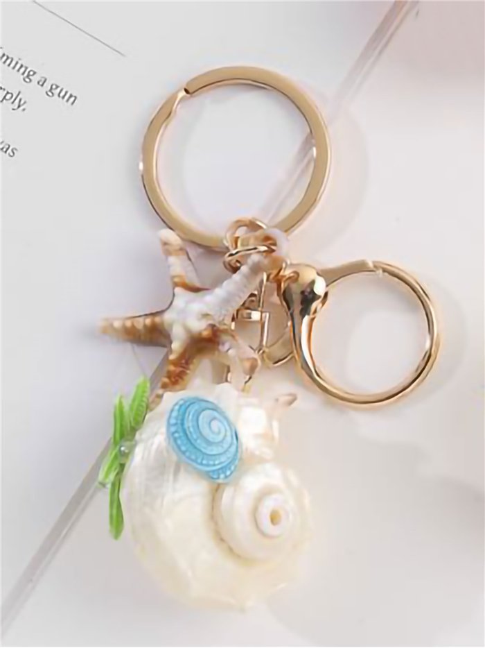 Llavero concha marina efecto natural con estrella y pez