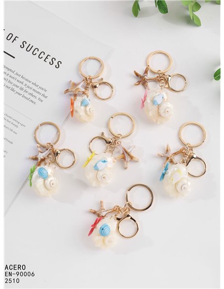 Llavero concha marina efecto natural con estrella y pez