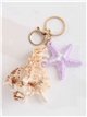 Portachiavi a forma di conchiglia corallina con effetto naturale e stella marina.