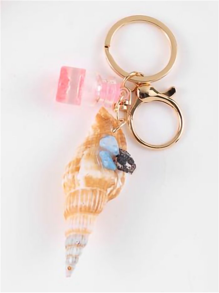Porte-clés coquillage effet naturel avec bouteille décorative