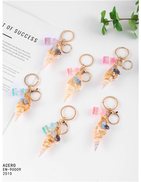 Porte-clés coquillage effet naturel avec bouteille décorative