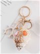 Portachiavi a forma di conchiglia corallina con effetto naturale e ciondoli marini.
