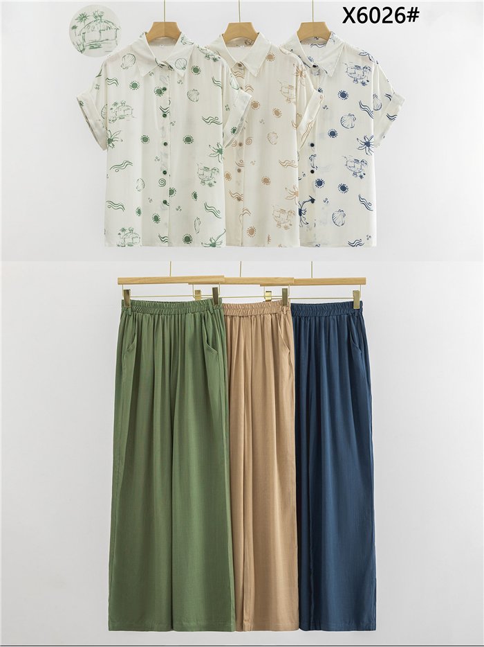 Conjunto camisa estampada y pantalón con cinturón efecto rafia