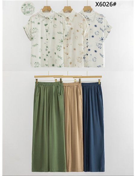 Conjunto camisa estampada y pantalón con cinturón efecto rafia