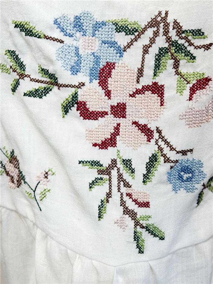 Floral embroidered peplum top