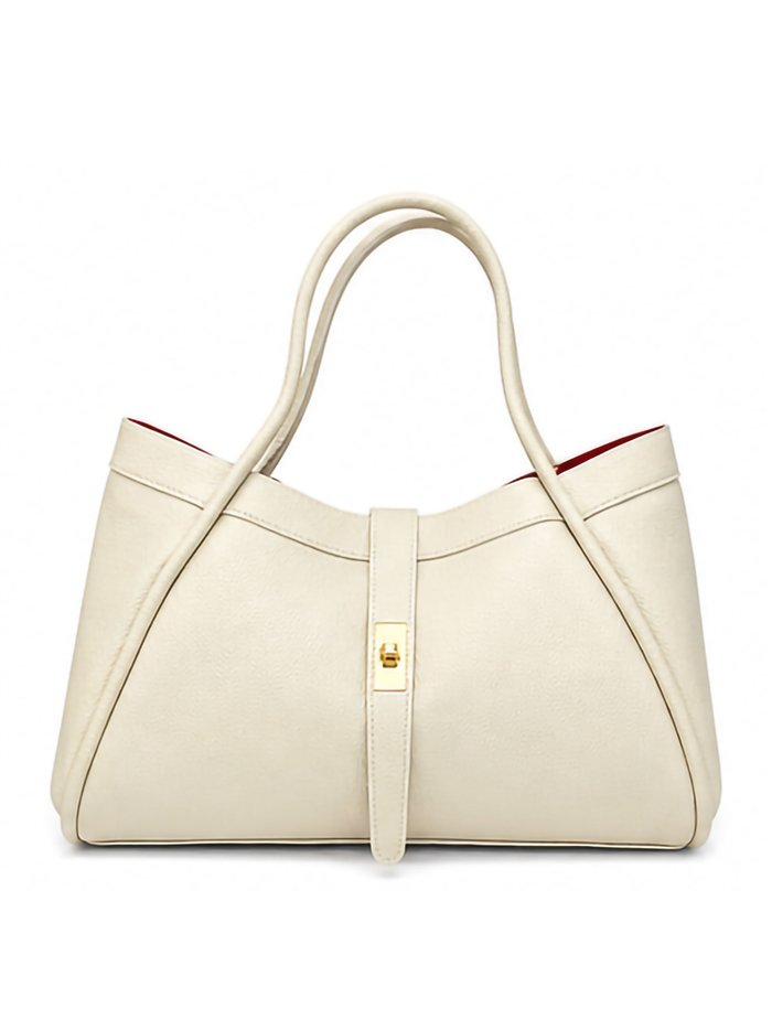 Bolsa de compras em couro com fecho central.