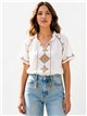 Blusa bordada com franjas