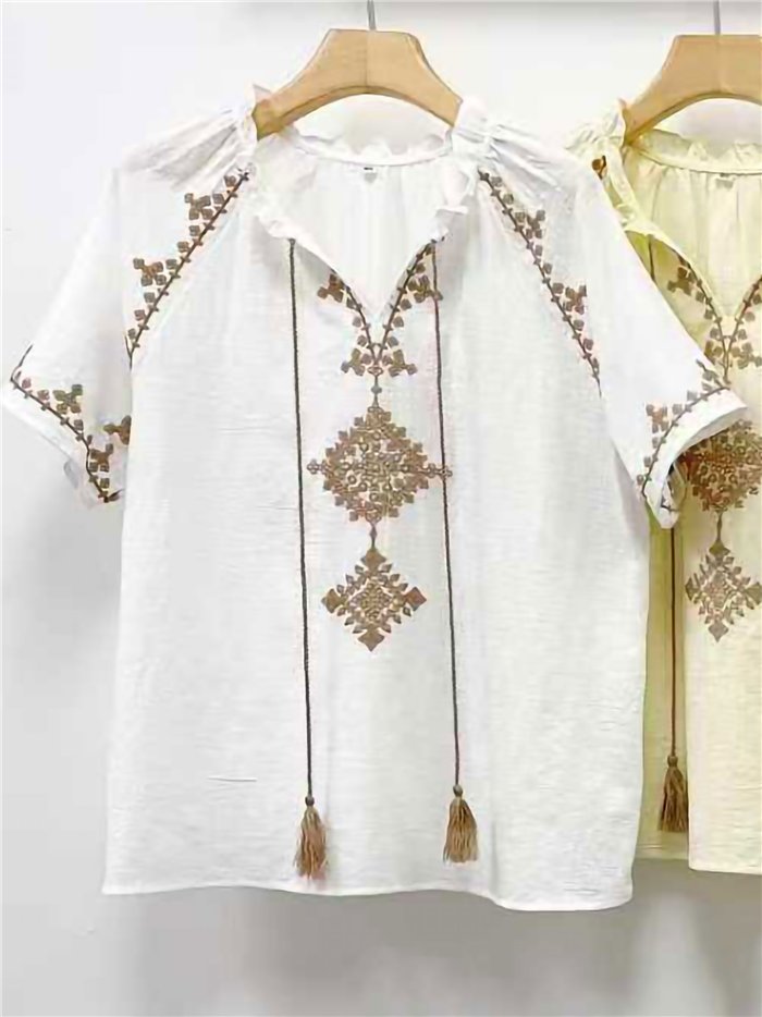 Blusa bordada com franjas
