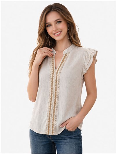 Blusa de linho sem mangas com bordado.