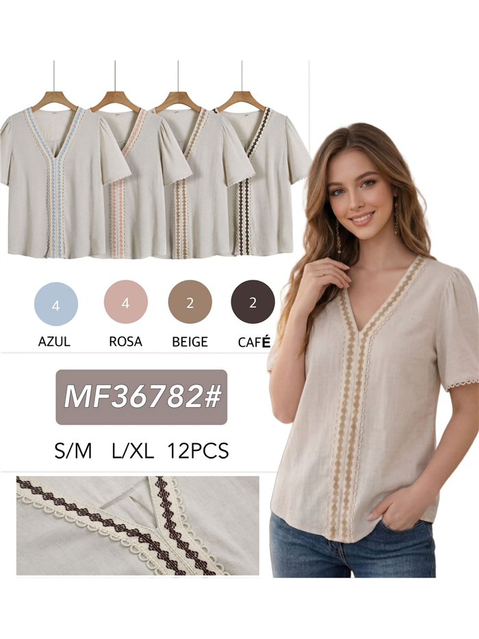 Blusa de linho bordada com mangas curtas.