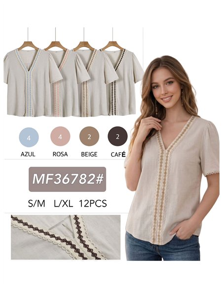 Blusa de linho bordada com mangas curtas.