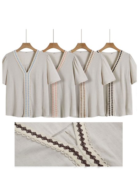 Blusa de linho bordada com mangas curtas.