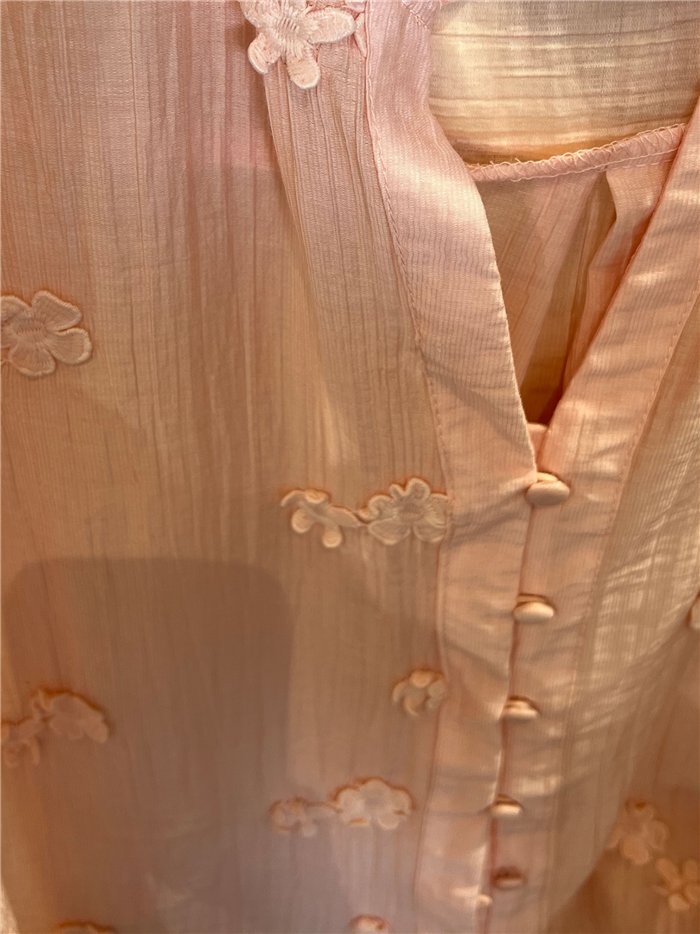 Blusa sem mangas com flores bordadas