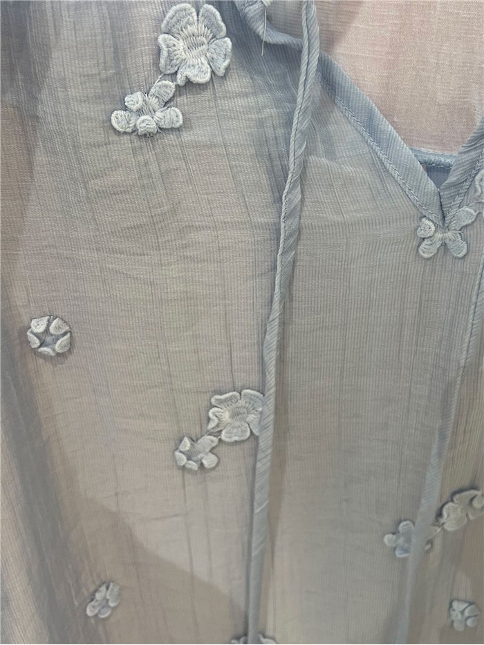 Tie neck floral embroidered sleeveless blouse