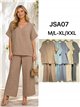 Conjunto plus size: blusa fluida com decote em V e calça palazzo.