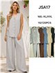 Completo taglie forti: canotta fluida e pantaloni palazzo