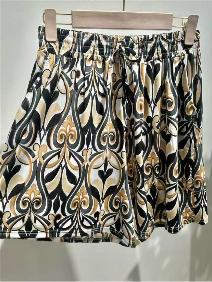 Pantalón corto lycra estampado art déco