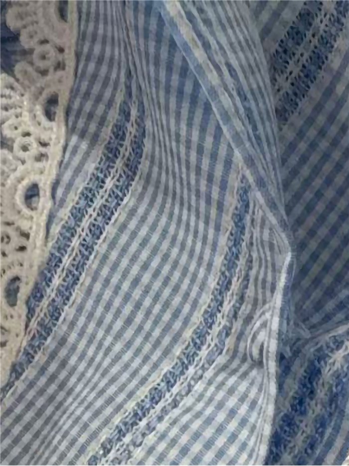 Camisa vichy sin mangas con volantes