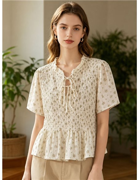 Blusa floreale arricciata con peplo