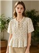 Blusa floreale arricciata con peplo