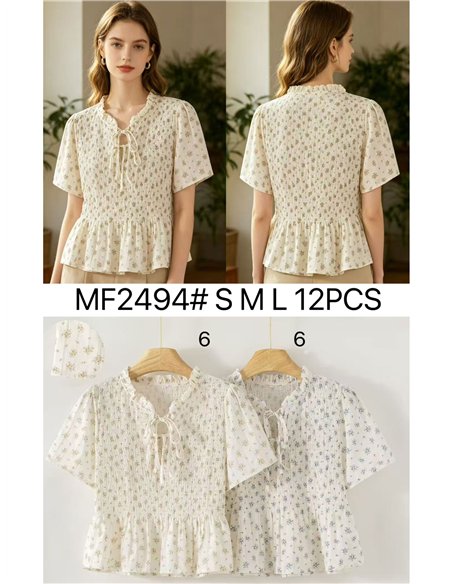 Blusa floreale arricciata con peplo