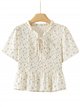 Blusa floreale arricciata con peplo