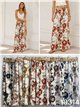 Pantaloni a gamba larga con stampa floreale e cintura