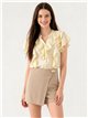 Short falda con adorno