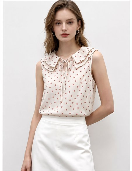 Blusa lunares sin mangas con cuello bobo