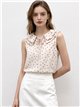 Blusa lunares sin mangas con cuello bobo