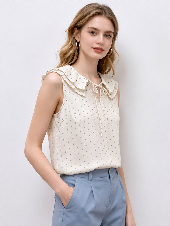 Blusa lunares sin mangas cuello volante