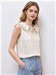 Blusa lunares sin mangas cuello volante