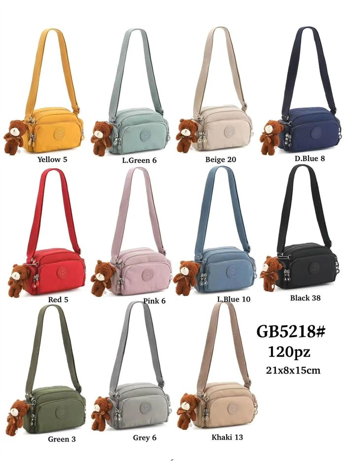 Bandolera nylon compacta con charm de osito