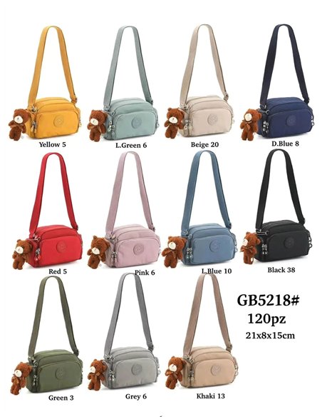 Bandolera nylon compacta con charm de osito