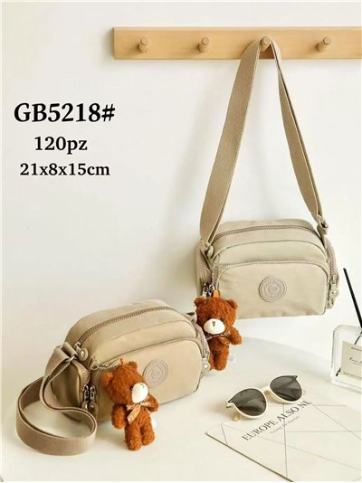 Bandolera nylon compacta con charm de osito