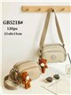 Bandolera nylon compacta con charm de osito