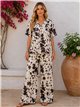 Conjunto blusa estampada vaca y pantalón