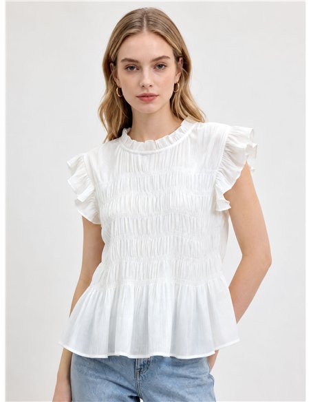 Blusa nido de abeja con volantes
