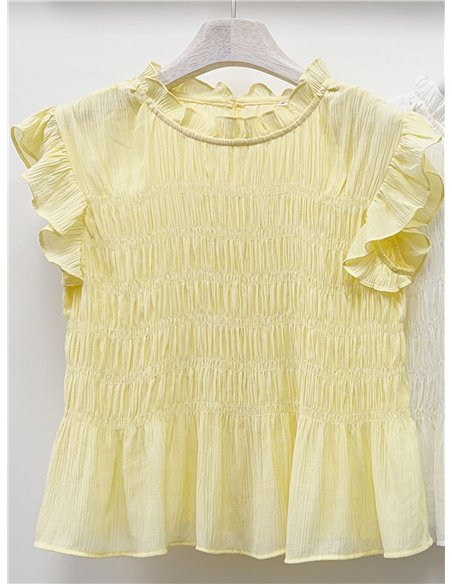 Blusa nido de abeja con volantes