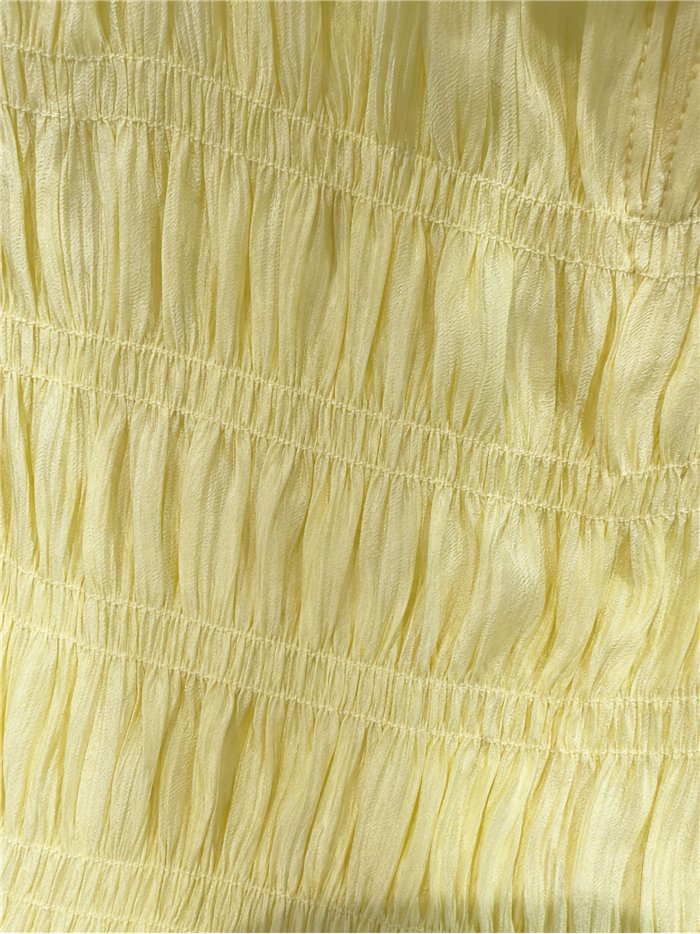 Blusa nido de abeja con volantes