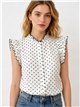 Blusa lunares con volante