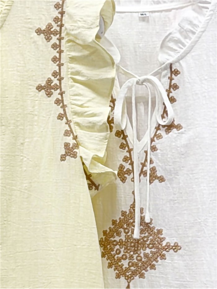 Camicetta ricamata con fiocco
