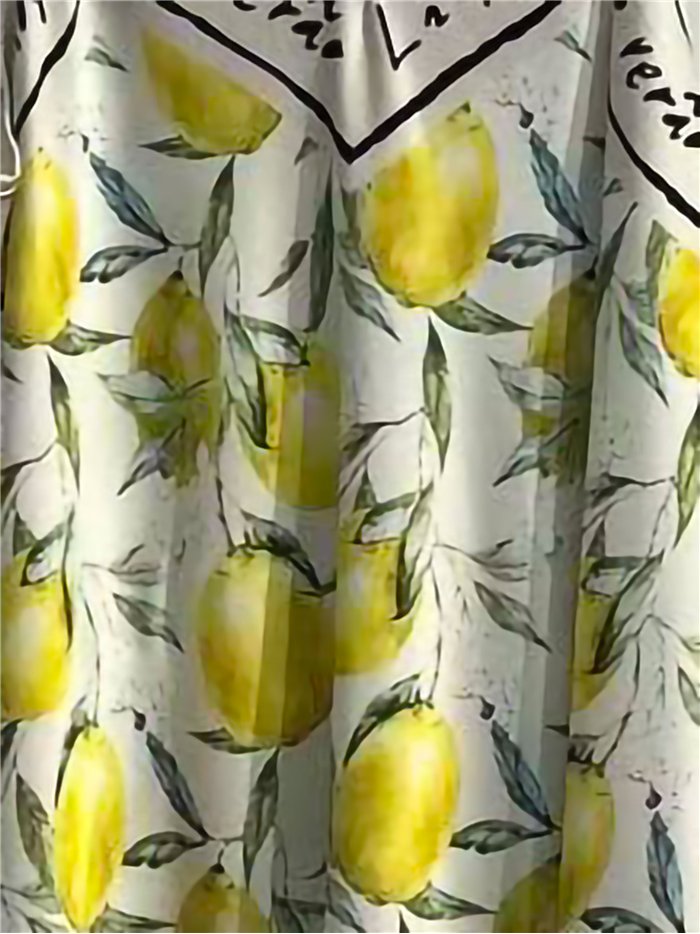 Robe longue en satin à bretelles imprimées citron