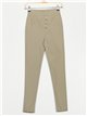 pantaloni super skinny con bottoni