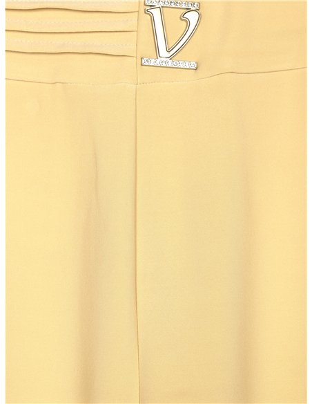 Pantaloni a zampa con dettagli metallici