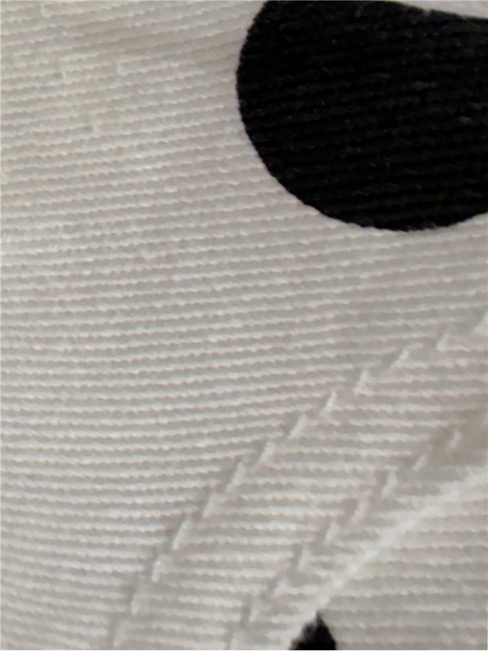 Pantalón vaquero barrel de lunares negros