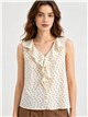 Blusa de lunares con volante